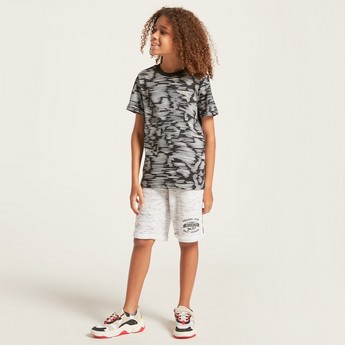 PUMA All-Over Printed T-shirt with Short Sleeves