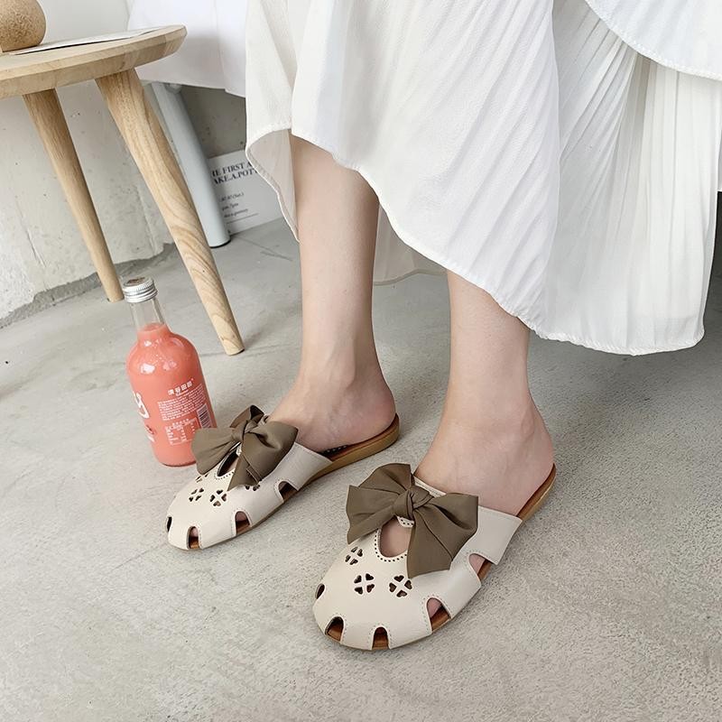 Slippers women's clothing outside 2021 summer new versatile Korean fashion beach shoes flat bottom sandals baotou semi sandals