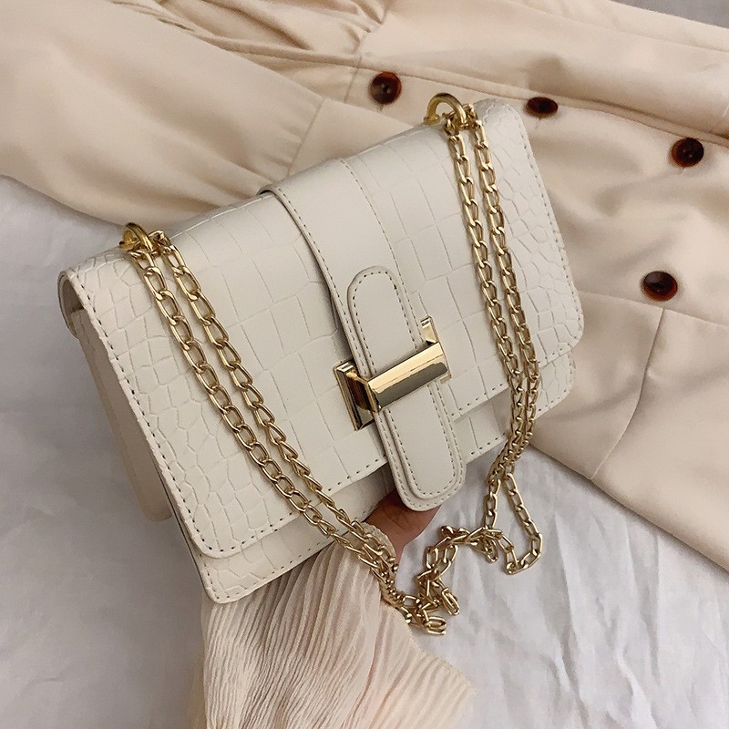 Bag women's shoulder bag stone pattern messenger women's bag 2022 spring new embossed solid color small square bag