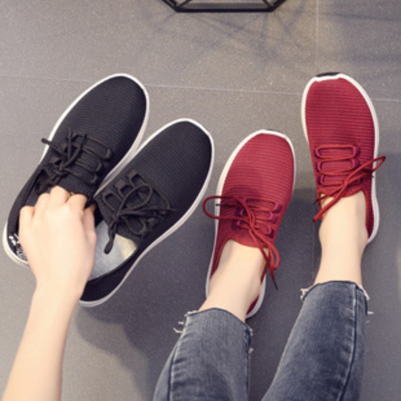 Flying knit shoes for women 2021 spring new casual student breathable sports anti-slip sweat-absorbent slip on cloth shoes