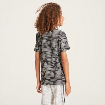 PUMA All-Over Printed T-shirt with Short Sleeves