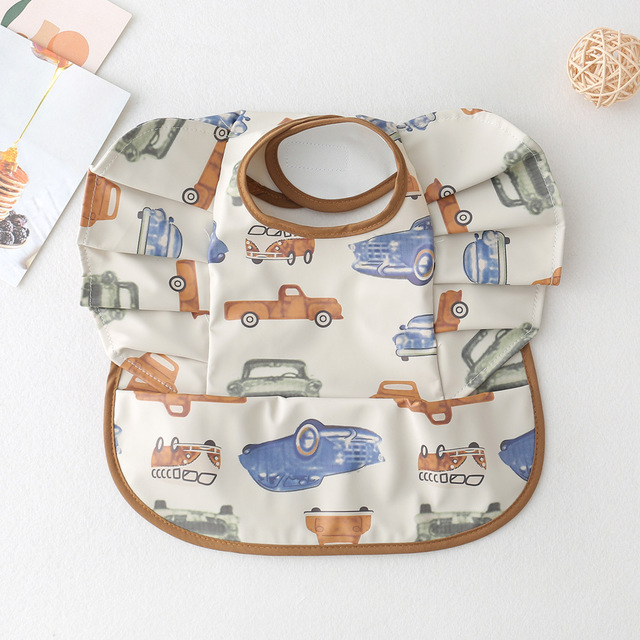 Waterproof Baby Food Eating Baby Bibs PU Cartoon Smock For Babies Feeding Clothes Sleeveless Bib With Pocket Newborn Baby Bib