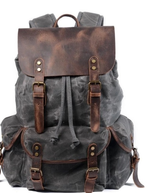 Men's casual genuine leather school bag large capacity canvas travel bag outdoor mountaineering computer bag male backpack