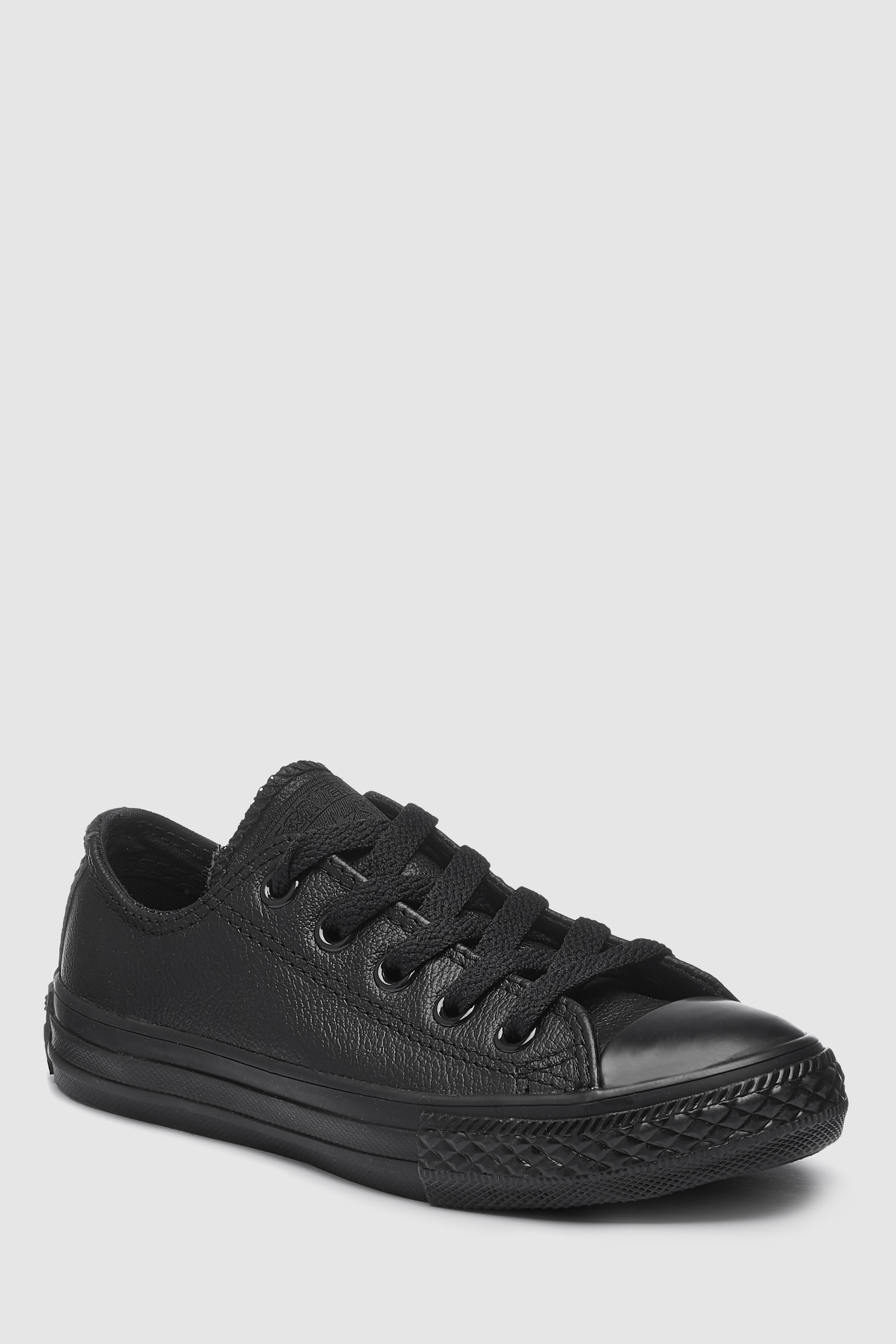 حذاء رياضي منخفض Chuck Taylor Ox جلد أسود من Converse