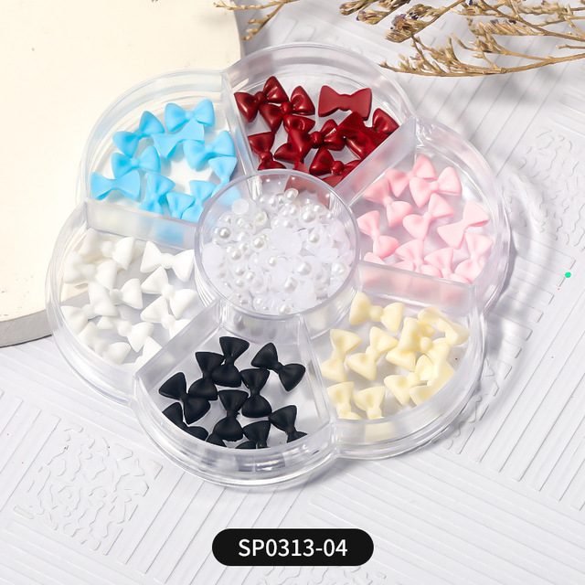 1 Box of 7 Nail Art Decorations Bow Aurora Bear Butterfly Rhinestone Pearl Mixed Set Box DIY Nail Decoration designer charms