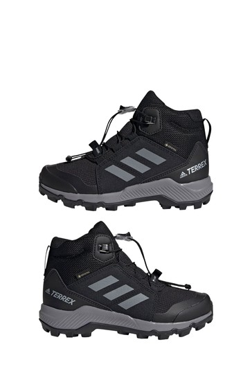 حذاء رياضي أسود للشباب والصغار Terrex Mid Gore Tex من Adidas