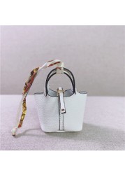 Famous designer 100% genuine leather hanger keychain color pendant decoration lady bag charm accessories trinket gifts basket bag