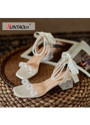 Mid-heel pearl strap sandals women's thick heel 2022 summer transparent one word with crystal high heels