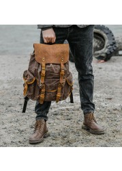 Men's casual genuine leather school bag large capacity canvas travel bag outdoor mountaineering computer bag male backpack