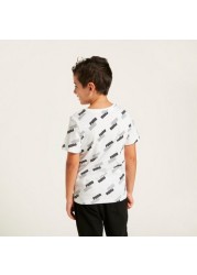 PUMA ALl-Over Logo Print T-shirt with Short Sleeves