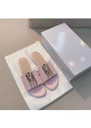 2022 summer new one word flat bottom sandals and slippers women letters metal buckle casual wear one step beach sandals